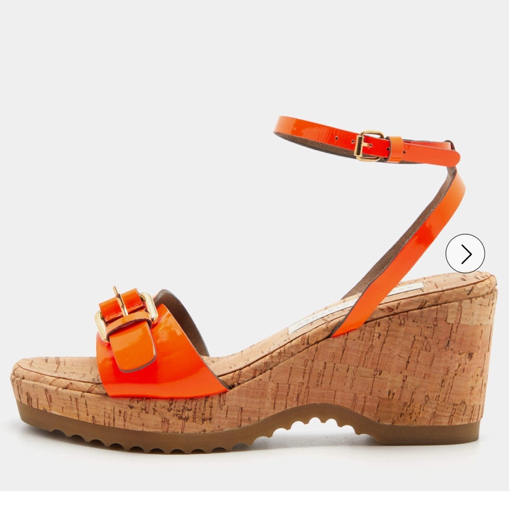 Stella MacCartney neon orange cork sandals.